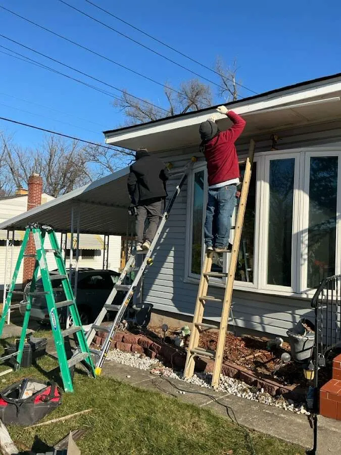 Restoration crew performing exterior repair in Kennett